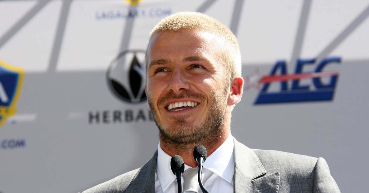 Beckham with a short, bleached and tousled hairstyle