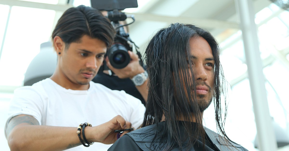 Cutting men's long hair