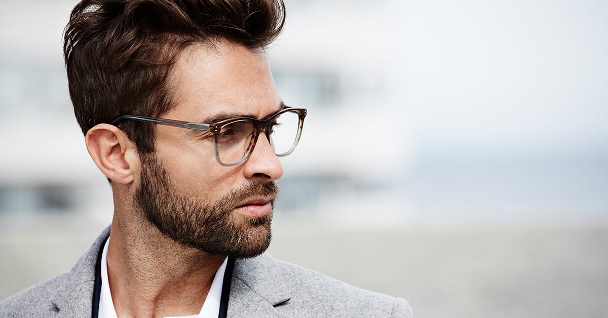 Man with short beard and glasses