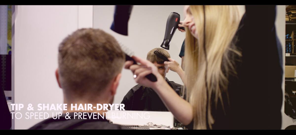 Shake the blow dryer to speed up the process and prevent burning