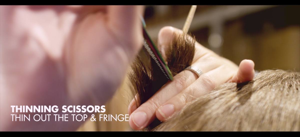 Thin out the hair with a thinning scissor