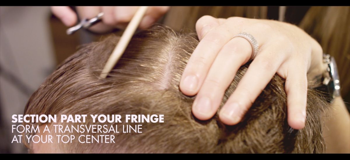 Section your fringe with a transversal line at the top center of your hair