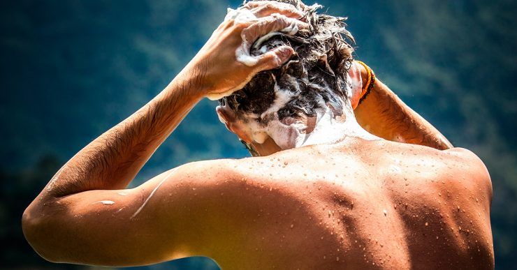 Man shampooing his hair