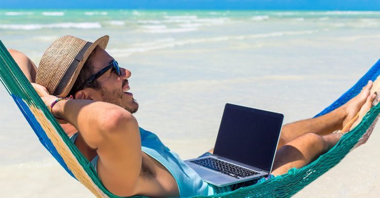 How to protect your hair from sun man in hammock with computer