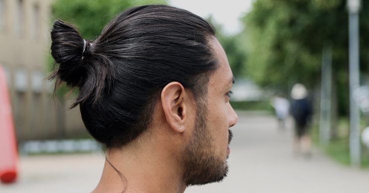 Perfect man bun in long hair