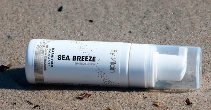 By vilain Seabreeze Seasalt spray lying on a sandy beach